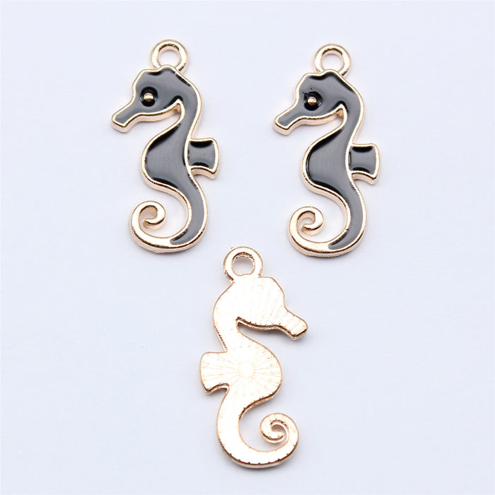 Black and White Enamel Seahorse Charm with Gold Tone Outline