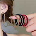 Large Glossy Round Hoop Earrings in Brown and Deep Red view 1