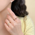 Gold Tone Chain Link Open Rings With Blue And Red Oval Stones view 2