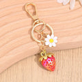 Gold-Tone Strawberry Charm Keychain With Daisy And Bee Accents view 12
