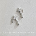 Silver Tone Four Point Star Clear Stone And Teardrop Stud Earrings view 4