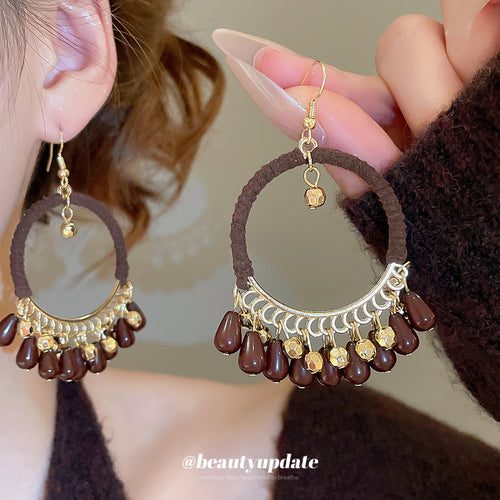 Thread Wrapped Hoop Beaded Fringe product shown worn on an ear