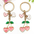 Four Pink and Red Cherry Heart Metal Keychain Designs view 1
