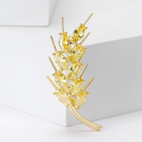 Gold Tone Wheat Stalk Brooch shown on a clean white display