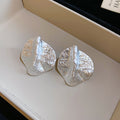 Irregular Folded Disc Stud Earrings in Gold and Silver Tones view 7