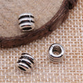 Three-Ridge Large-Hole Spacer Beads in Two Antique Finishes view 2