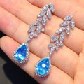 Blue Teardrop and Leaf Cluster Long Drop Earrings in Silver Tone view 2