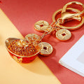Coin Chain and Crystal Ingot Keychains in Red and Gold Finishes view 4