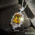 Silver Tone Yellow Emerald Cut Crystal Halo Pendant Necklace view 5