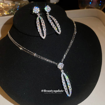 Open Oval Crystal Necklace and Drop Earrings in Silver Tone