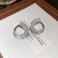Crystal Open Teardrop Hoop Earrings In Silver And Gold Tones view 6