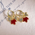Red Maple Leaf Crystal Look Gold Tone Huggie Earrings view 4