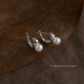 Silver Geometric Huggie Hoop Earrings White Pearl Accent view 4