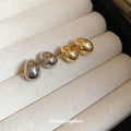 Polished Teardrop Stud Earrings In Gold And Silver view 1