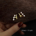 Gold Asymmetric Triple Pearl Bar Stud Earrings Pair view 3
