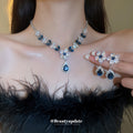 Deep Blue Flower And Teardrop Crystal Earrings And Necklace In Silver Tone view 2