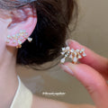 Crystal Branch Ear Clips in Three Metallic Colorways view 4