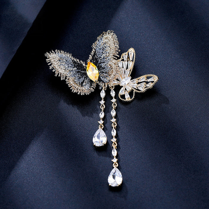 Blue Textile Butterfly Brooch With Gold Wing And Crystal Tassels