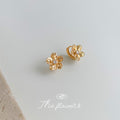 Gold Five Petal Flower Huggie Earrings Clear Center Stone view 3