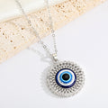 Large Round Crystal Halo Blue Evil Eye Pendant Necklaces in Two Finishes view 3