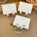 Two Tone Irregular C Hoop Stud Earrings With Polished Metal Details view 1