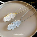 Wavy Translucent Resin Pendant Necklaces in Gold and Silver Tones view 2