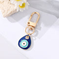 Gold Tone Blue Evil Eye Heart Round and Teardrop Clip Keychains view 4