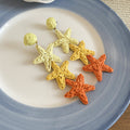 Woven Starfish Drop Earrings With Polished Metal Tone Details view 8