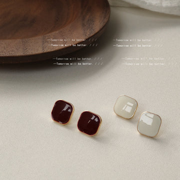 Gold Tone Rounded Square Stud Earrings In White And Burgundy