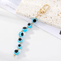 Gold Tone Colorful Evil Eye Bead Clip Keychains in Seven Colors view 3
