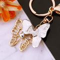 Hollow Crystal Butterfly Keychains in White Fuchsia and Yellow view 5