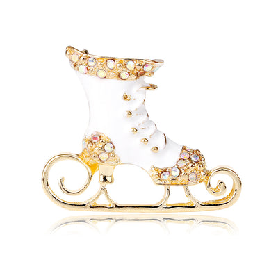 Front product view of the christmas stocking brooch pin in gold