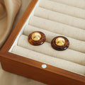 Round Resin Stud Earrings Gold Dome Center Smoke and Amber view 2