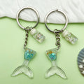 Starfish, Shell and Mermaid Charm Keychains Featuring Flower Across 29 Pictured Variations view 1