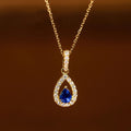 Gold Blue Pear Teardrop Halo Pendant Necklace Clear CZ Frame view 5