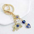 Elephant And Evil Eye Bead Keychain With Rhinestone Charm Cluster view 8