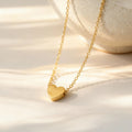 Sculpted Heart Pendant Necklace in Gold and Silver Tone view 2