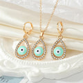 Gold Tone Crystal Teardrop Evil Eye Necklace and Earring Options view 3