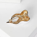 White Enamel Tooth Brooch with Gold Tone Crown Detail view 3