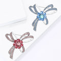 Silver Tone Rhinestone Bow Brooch Pink Blue Flower Center view 1