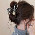 Gunmetal Tone Large Sculptural Loop Hair Claw With Black Round Bead view 2