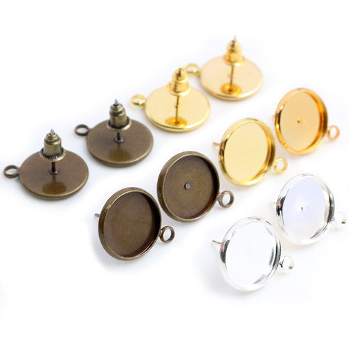 Round Bezel Earring Post Findings With Hanging Loop, grouped overview on a plain background