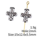 Antique Silver Cross Spacer Bead With Raised Scrollwork view 4