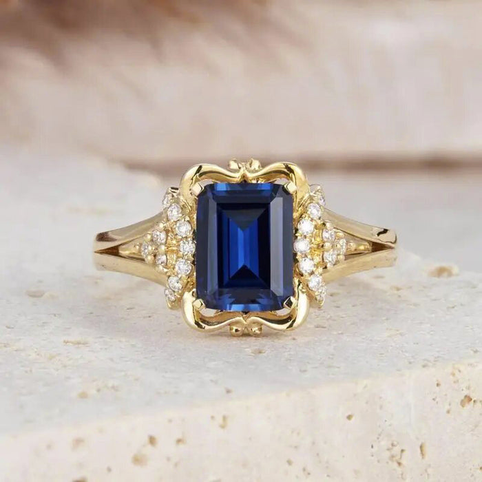 Gold Tone Blue Emerald Cut Center Stone Ring Clear Accents
