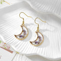 Gold Tone Crescent Moon Pressed Flower Drop Earrings in Eight Designs view 11