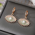 Gold and Silver Tone Crystal Pearl Evil Eye Huggie Earrings view 6