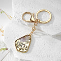 Pressed Flower Irregular Resin Keychains with Gold Tone Clips view 3