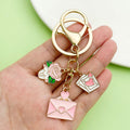 Flower Charm Keychains Featuring Pink Heart Across 35 Pictured Variations view 1