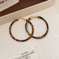 Geometric Hoop Earrings In Six Brown Red And Animal Prints view 9