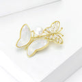 Double Butterfly Brooch in Metal with Gold-tone Outlines and Pale Shell-like Wings view 3